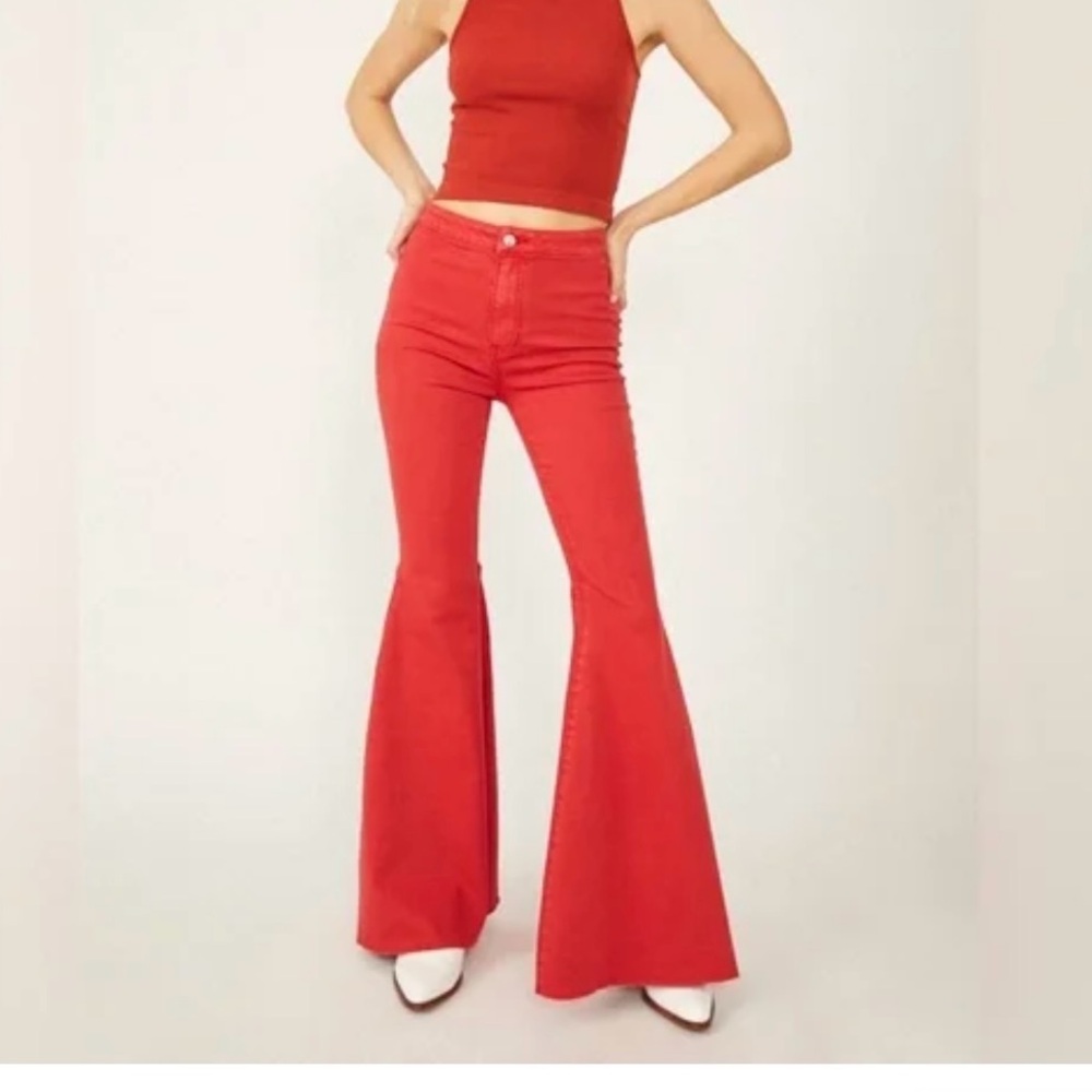 FP Free People red wide flair jeans.
WE THE FREE
